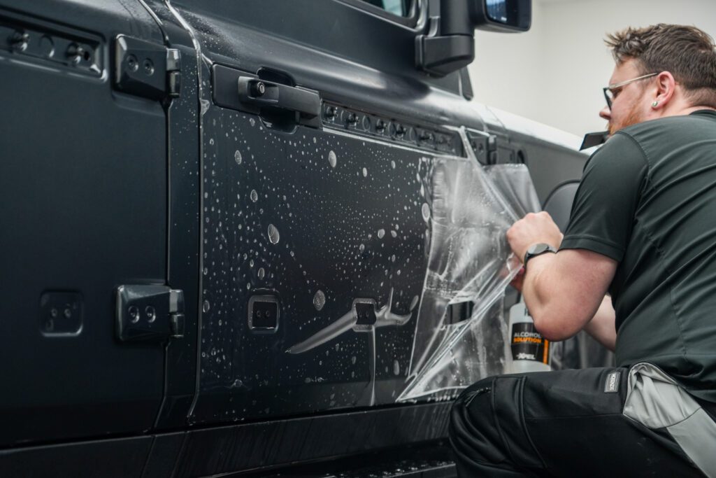 Door panel being fitted